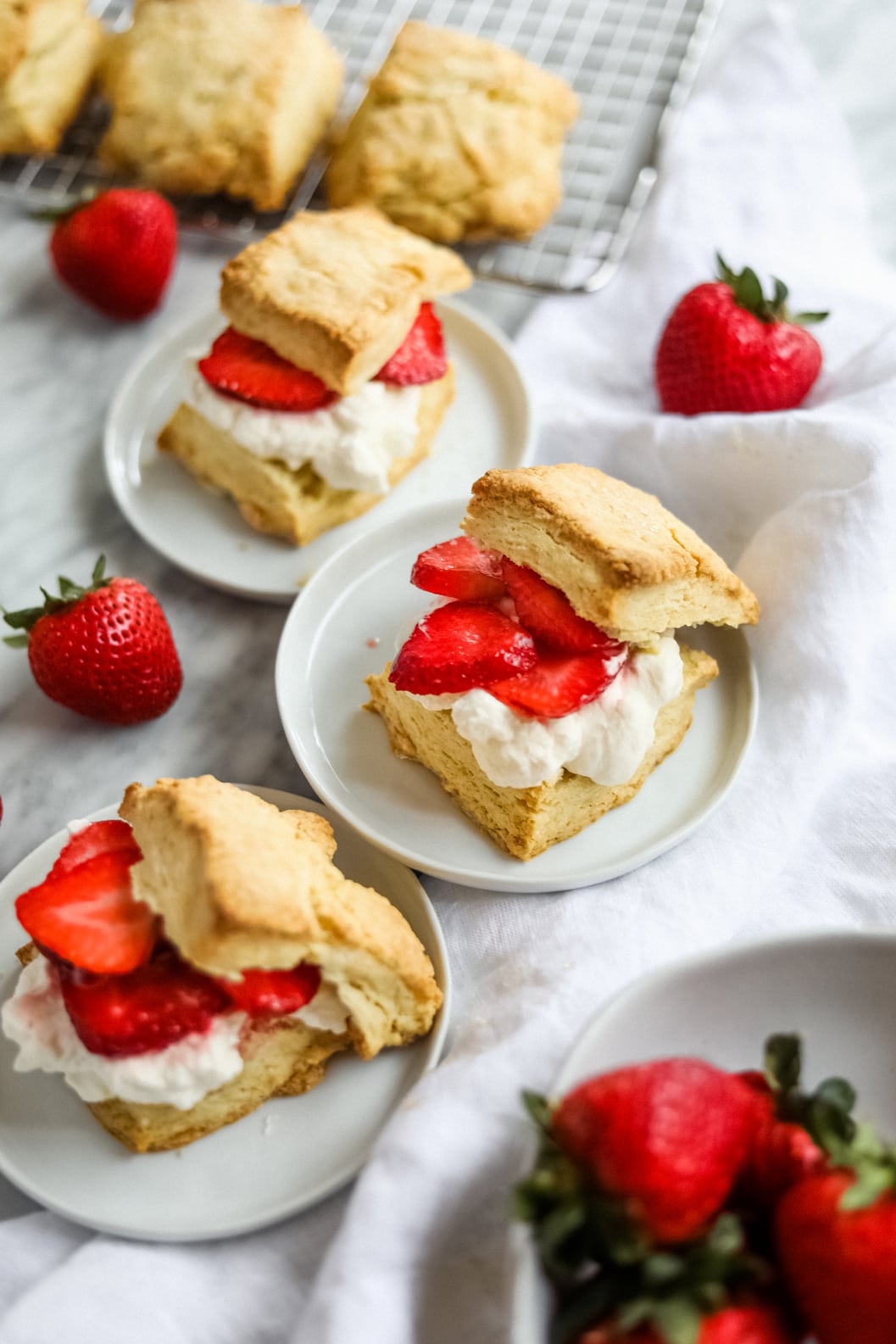 easy strawberry shortcake on white plates